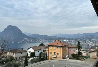 Panoramic Apartment Ruvigliana has Balcony rooms