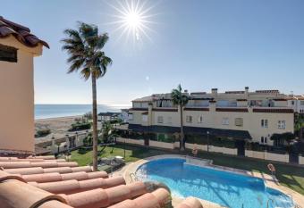 Luxury modern beachfront 3 bed gated community townhouse with pool, sun terrace, sea views close to all amenities has Balcony rooms