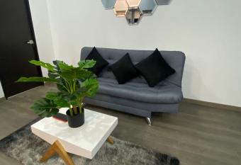 Hotel Hostal Caps El Poblado has rooms with a private hot tub