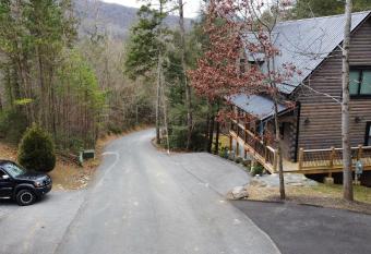 New Luxury Vacation Home Cabin in Smoky Gatlinburg - Theater Room has rooms with a private hot tub