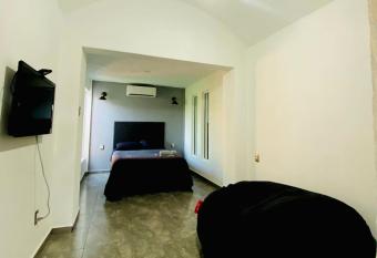 Casa Black white has rooms with a private hot tub