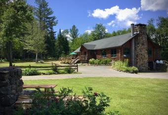 Lodge on Big Brook adjoining state easement Hunter   s/snowmobile paradise has Balcony rooms