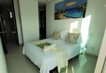 Apartamento en el Rodadero-Piscina-Jacuzzi-WiFi has rooms with a private hot tub