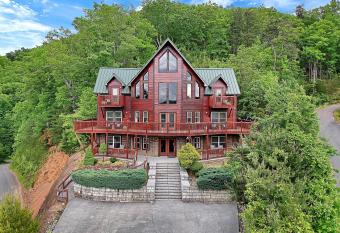 Scenic Cabin w Mountain Views Game Room Jacuzzi in Every Bedroom has rooms with a private hot tub