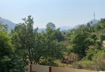 On the highway yet an orchard has Balcony rooms