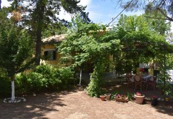 The pretty house next to the beach (Aleca s House) has Balcony rooms
