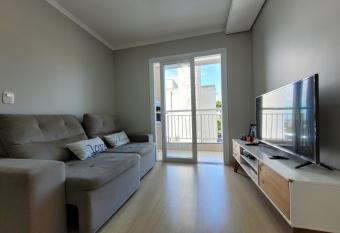 Apartamento entre o Centro e a UCS has Balcony rooms