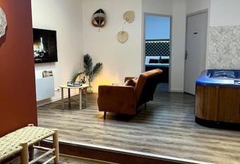 La suite, avec jacuzzi & sauna has rooms with a private hot tub