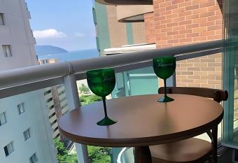 Book Santos - Estanconfor 1206 - Amplo, aconchegante na quadra da praia do Gonzaga! has Balcony rooms