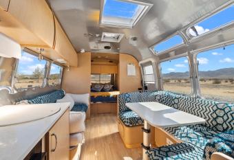 Desert Delight 2 bedroom glamp has rooms with a private hot tub
