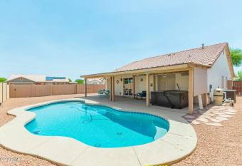 Modern villa with sparkling pool and hot tub! has rooms with a private hot tub