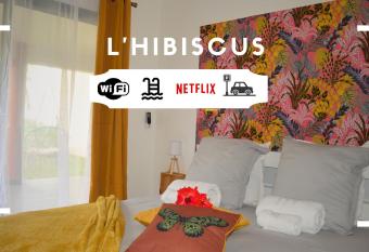 L Hibiscus T2 Piscine terrasse parking has Balcony rooms