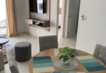 Acogedor dpto! Zona Conmebol 505 has Balcony rooms