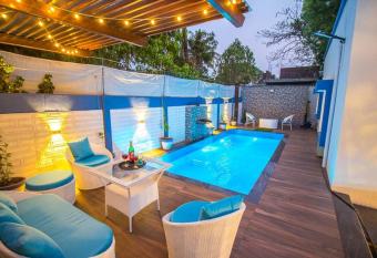 A plush and serene 3BHK pool villa in nashik. has Balcony rooms