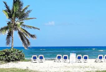 T2 tout confort PLAGE 200m , Rez de jardin arbor  . has Balcony rooms