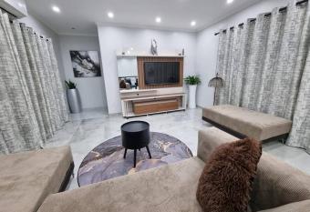 Luxury Secured Apartment has rooms with a private hot tub