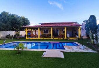 S  tio Eu Sosseguei - Casa de veraneio com piscina e churrasqueira has Balcony rooms