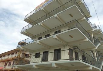 SHARMAS HOLIDAY APARTMENTS allows 18 year olds to book a room