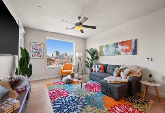 Downtown Walking Oasis with King BD and City View has rooms with a private hot tub