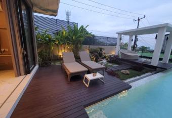 Natta Bali Ungasan Five-Bedroom Villa with Private Pool has Balcony rooms