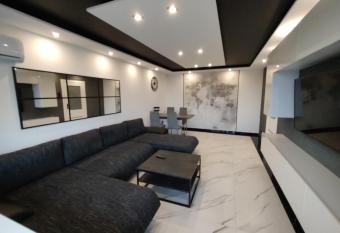 Apartament MERCURY has rooms with a private hot tub