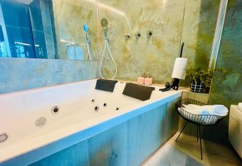 C Tower Premium Apartments, Panoramic Sea View has rooms with a private hot tub