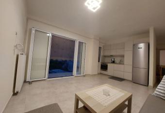 Theos Apartment has Balcony rooms